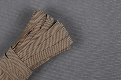 Тесьма эластичная 10мм Т.Бежевый - изображение