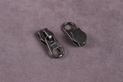 Бегунок для оборотной спиральной молнии Т7 Т.Никель Бегунок для оборотной спиральной молнии Т7 Т.Никель - изображение