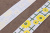 Репсовая лента с рисунком 25мм Ромашки Белый/желтый/т.зеленый